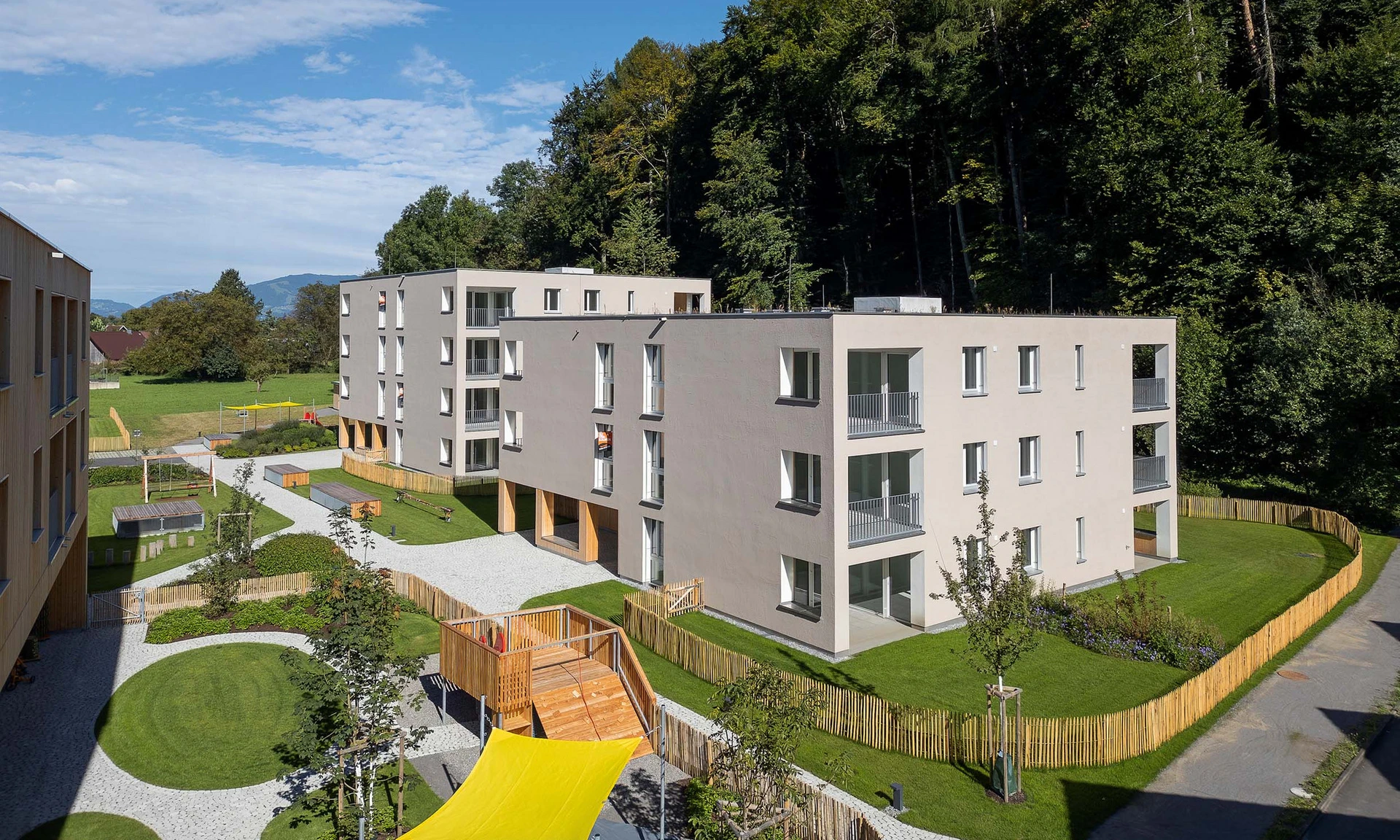 Drohnenaufnahme einer neuen Wohnanlage von Wilhelm+Mayer in Koblach Kutzen.